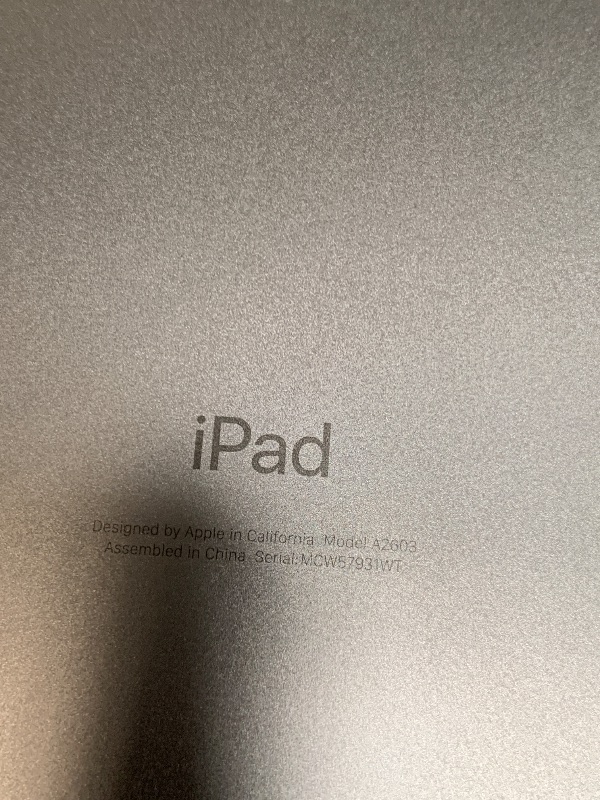 Photo 1 of ** SERIAL MCW57931WT**  It turns on, but it doesn't charge. ** Apple 2021 iPad 9th Gen (10.2 inch, Wi-Fi + Cellular, 64GB) Space Gray (Renewed Premium)