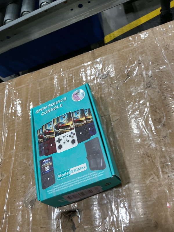 Photo 1 of ?R36MAX 4000mAh Portable Rechargeable Handheld Retro Game Console,Comfort Non-Slip Handheld Standing Retro Game Console with 64G TF Car,4.0-inch Screen,for Office,Black