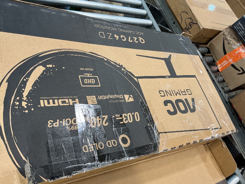 Photo 1 of **FOR PARTS**AOC Q27G4ZD 27" QD OLED Gaming Monitor, QHD 2560 x 1440, 240Hz 0.03ms, HDMI 2.0 x2, Display Port x2, G-Sync Compatible, Console Gaming Ready, 3-Year Zero-Bright-Dot