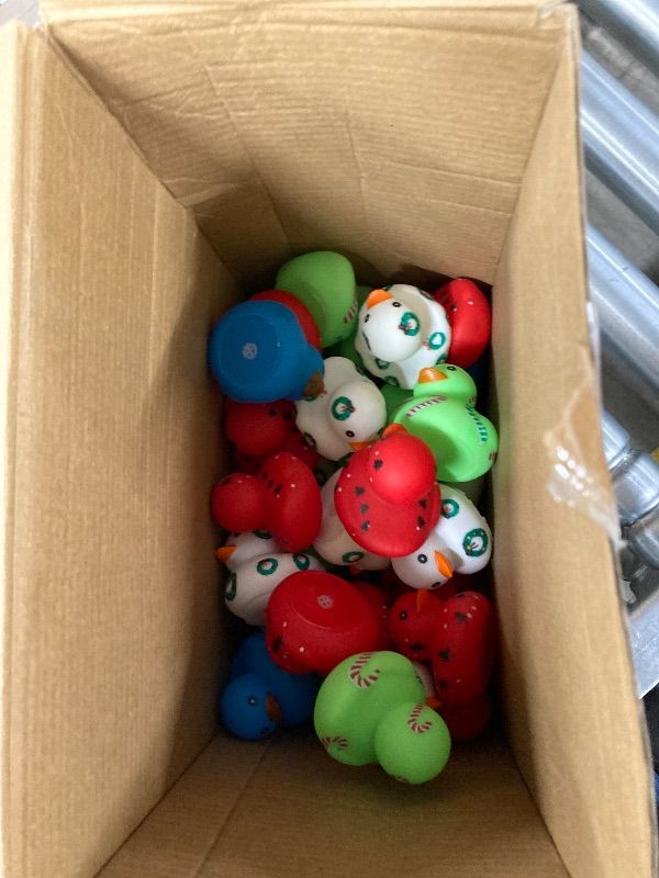 Photo 1 of ***MISSING PIECES -SELLING AS IS*** Poen 41 Pcs Christmas Glow in The Dark Rubber Ducks Christmas Rubber Ducks Bulk Light up Mini Duckies Bathtub Toys for Girls Boys Favors Birthday Pool Rewards (Cute Style)  ***BOX RIPPED/TORN***