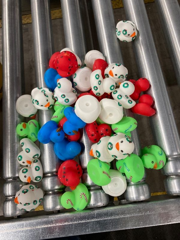 Photo 1 of ***MISSING PIECES -SELLING AS IS*** Poen 41 Pcs Christmas Glow in The Dark Rubber Ducks Christmas Rubber Ducks Bulk Light up Mini Duckies Bathtub Toys for Girls Boys Favors Birthday Pool Rewards (Cute Style)  ***BOX RIPPED/TORN***