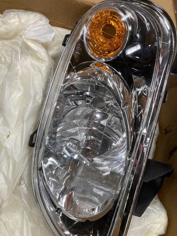 Photo 1 of *PARTS ONLY?SELLING AS IS* *Light piece broken* MARSFLUX Headlight Assembly Chrome Housing Amber Reflector OE GM2502262, GM2503262 Replacement For Replacement for 2006-2011 Chevy HHR, Pack of 2 Driver and Passenger Side
