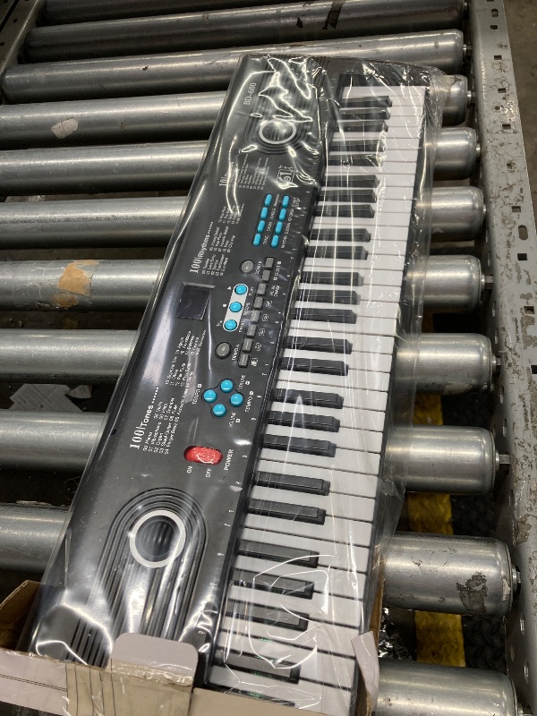 Photo 1 of ***MISSING POWER CORD -SELLING AS IS *** 61 key keyboard Piano, Portable Electronic Digital Piano, Built In Dual Speakers, External Microphone, Rich Teaching Content, Multi-Functional Electronic Piano Suitable For Beginners (Black)