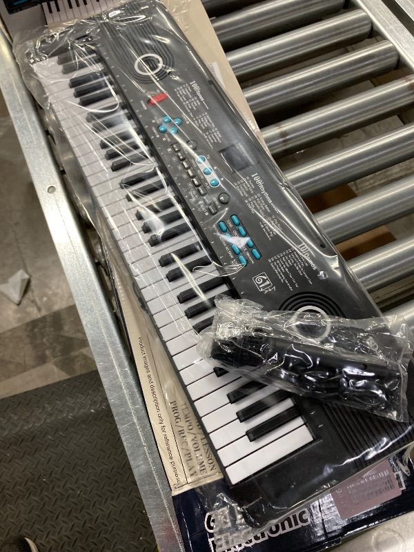 Photo 1 of ***MISSING POWER CORD -SELLING AS IS *** 61 key keyboard Piano, Portable Electronic Digital Piano, Built In Dual Speakers, External Microphone, Rich Teaching Content, Multi-Functional Electronic Piano Suitable For Beginners (Black)