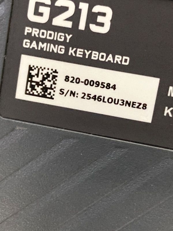 Photo 1 of ***DAMAGE -SELLING AS IS*** Logitech G213 Prodigy Gaming Keyboard - Wired RGB Backlit Keyboard with Mech-Dome Keys, Palm Rest, Adjustable Feet, Media Controls, USB, Compatible with Windows – Black