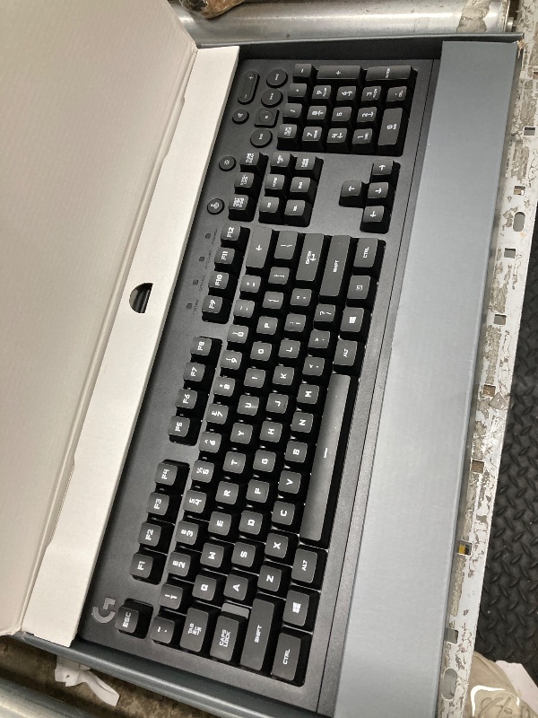 Photo 1 of ***DAMAGE -SELLING AS IS*** Logitech G213 Prodigy Gaming Keyboard - Wired RGB Backlit Keyboard with Mech-Dome Keys, Palm Rest, Adjustable Feet, Media Controls, USB, Compatible with Windows – Black