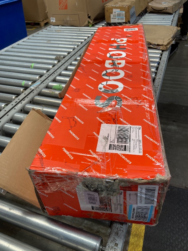 Photo 1 of  steering rack assembly, protective gloves, and a user manual. 