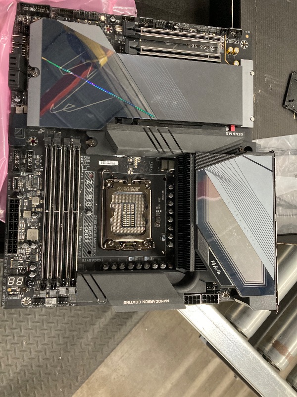 Photo 1 of ***Damaged, bent pins on CPU slot, it’s not permitted to Return, Not Refund***GIGABYTE Z790 AORUS Master X (LGA 1700/ Intel Z790 X/EATX/ DDR5/ 5* M.2/ PCIe 5.0/ USB 3.2 Type-C/Wi-Fi 7/ 10GbE LAN/Q-Flash Plus/EZ-Latch Plus/Motherboard)