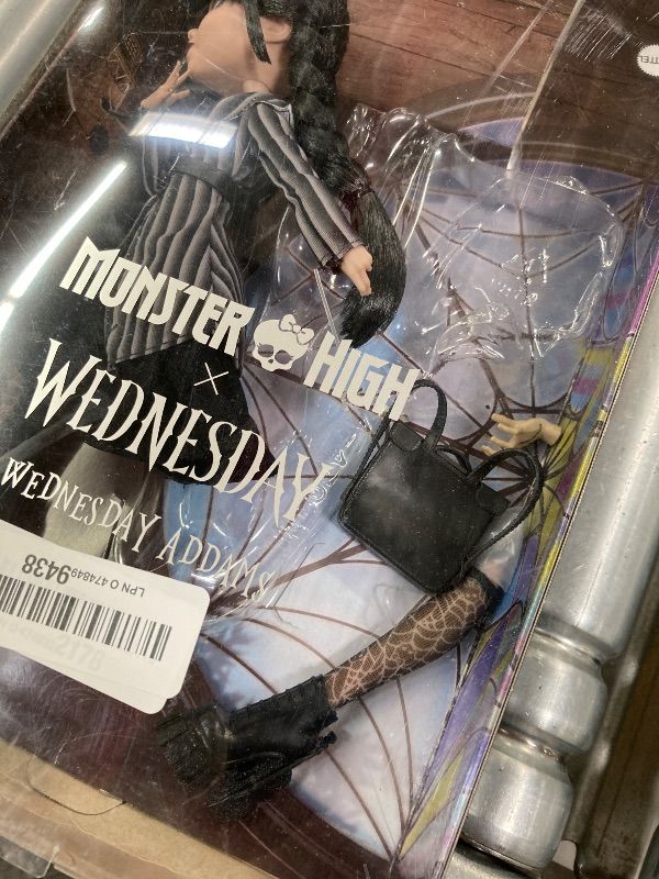 Photo 1 of ***LEG BROKEN OFF***Monster High Wednesday Doll and Accessories, Wednesday Addams Collectible in Nevermore Academy Uniform with Thing and Backpack, Doll Stand**LEG BROKEN OFF***