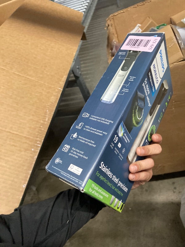 Photo 1 of ***MISSING PIECES -SELLING AS PARTS ONLY*** Norelco Philips Multigroom 7000 Series, All-in-One Trimmer, Beard Trimmer and Hair Clipper, 19-Piece Men's Grooming Kit for Beard, Head, Hair, Body, and Face, Soft Pouch, MG7910/49