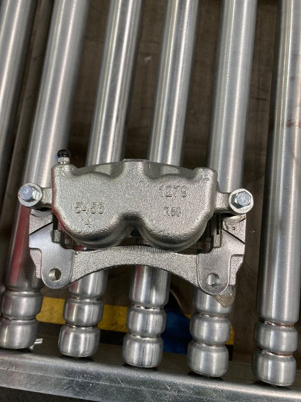 Photo 1 of ***ONE ONLY -MSSING ONE-SELLING AS IS*** A-Premium Front Disc Brake Caliper Assembly with Bracket Compatible with Select Dodge, Chrysler, Jeep, Ram and Volkswagen Models - Town & Country, Grand Caravan, Wrangler, Liberty, Routan, C/V, Nitro ***(BOX RIPPE