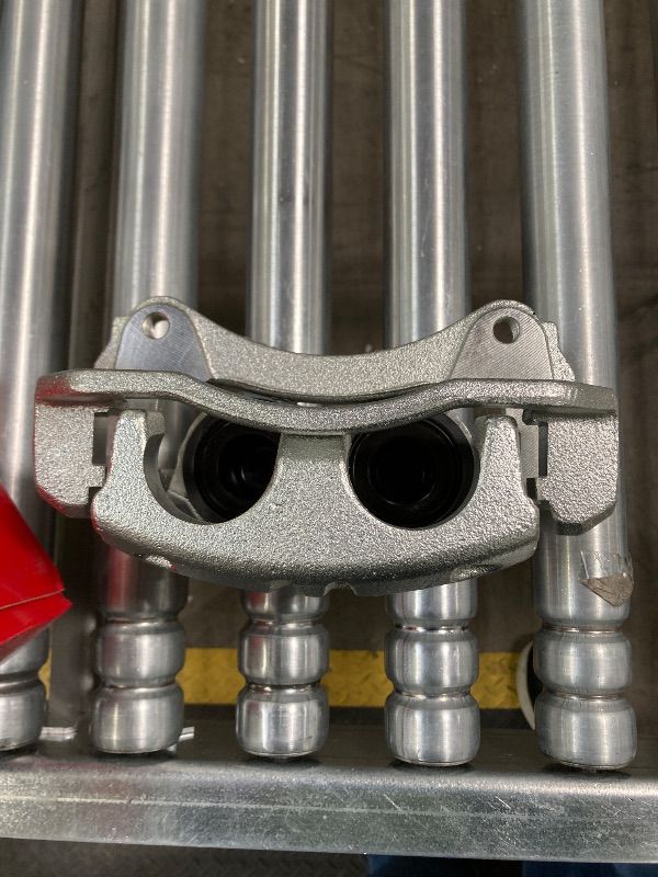 Photo 1 of ***ONE ONLY -MSSING ONE-SELLING AS IS*** A-Premium Front Disc Brake Caliper Assembly with Bracket Compatible with Select Dodge, Chrysler, Jeep, Ram and Volkswagen Models - Town & Country, Grand Caravan, Wrangler, Liberty, Routan, C/V, Nitro ***(BOX RIPPE