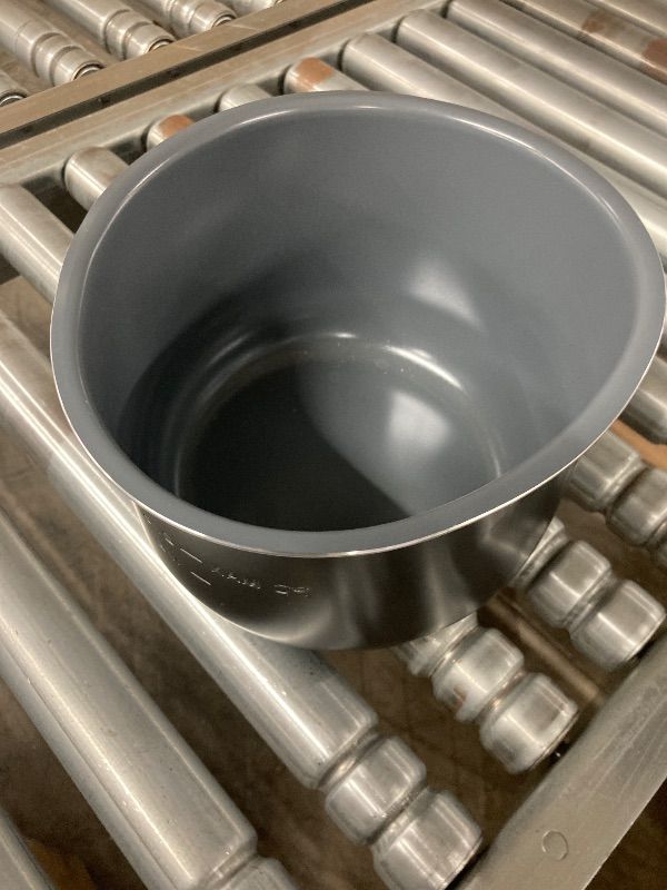 Photo 1 of **LARGE DENT**Instant Pot Ceramic Inner Slow Cooking Pot 6-Qt, Non-Stick Coated Interior, Rice Cooker