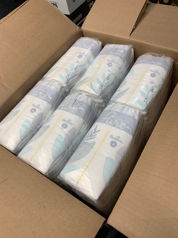 Photo 1 of ***DAMAGE TO A FEW LAYERS*** Pampers Pure Protection Baby Diapers, Size 4, 150 Count, Up to 100% Leakproof, Premium Plant-based Skin Protection, Hypoallergenic Soft Diapers