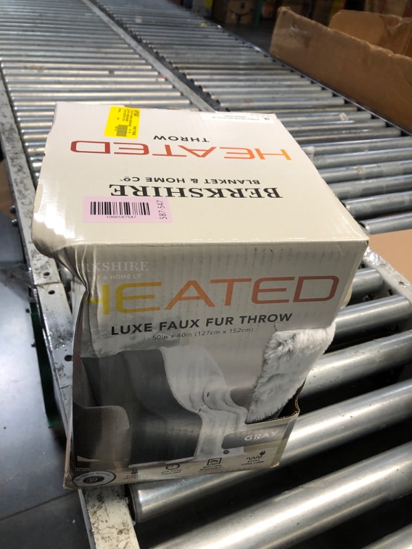 Photo 1 of ***STOCK PHOTO FOR REFERENCE ONLY*** Berkshire Life Heated Throw - 50 in X 60 in Electric Blanket - EZ Touch Button - 4 Heat Settings - Machine Washable - Extra Long Cord - Reversable White Luxe Faux Fur to Color - Dark Grey