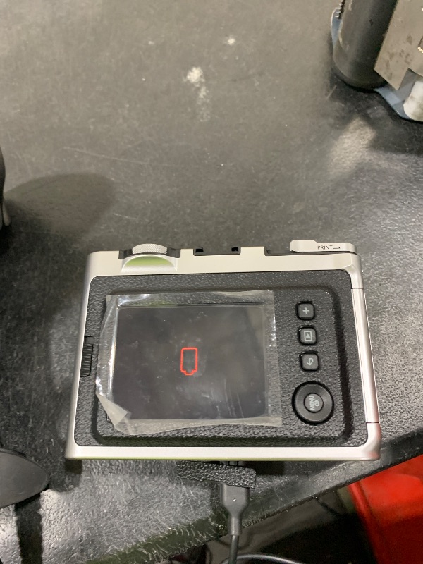 Photo 1 of Fujifilm Instax Mini EVO Instant Camera