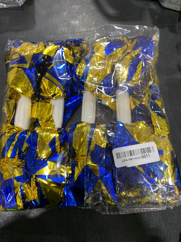 Photo 1 of 4 pom poms blue and yellow