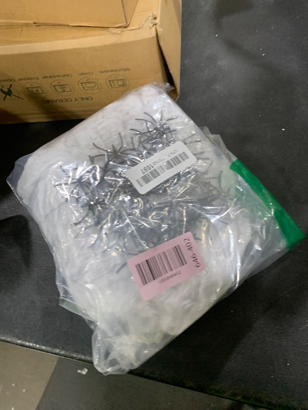 Photo 1 of 1000 sqft Spider Webs Halloween Decorations Bonus with 30 Fake Spiders, Super Stretch Cobwebs for Halloween Indoor and Outdoor Party Supplies