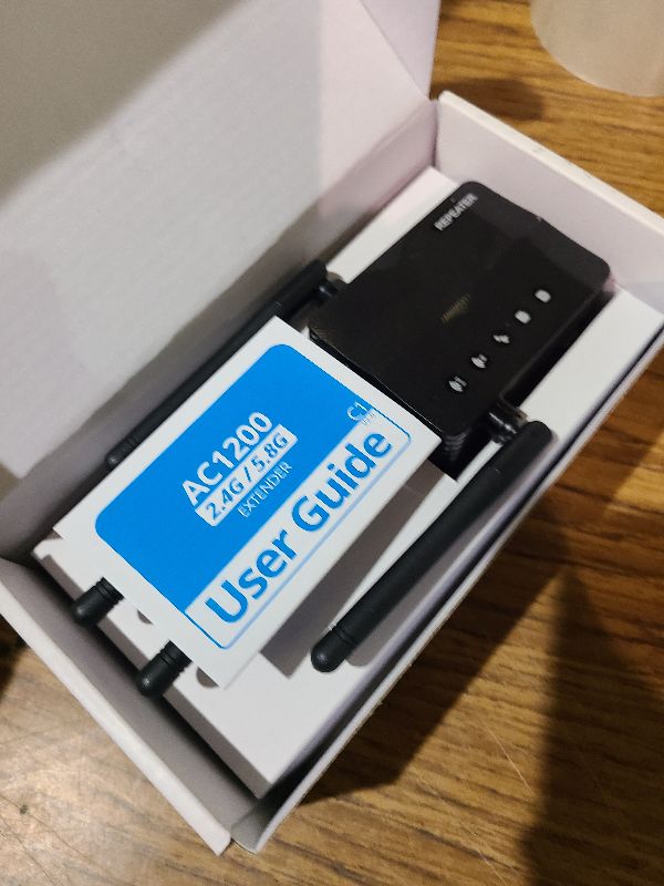 Photo 1 of 12880 Sq.Ft WiFi Extender Signal Booster, 1200Mbps WiFi Repeater, 105-Device Support, Simple Install, WiFi Extender with Wide Compatibility