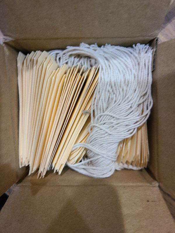 Photo 1 of 100 Small Manila Paper Tags with String - #1, 2 3/4” x 1 3/8” - Hang Shipping Labels with String Attached and Reinforced Hole, Pre-Strung Tags