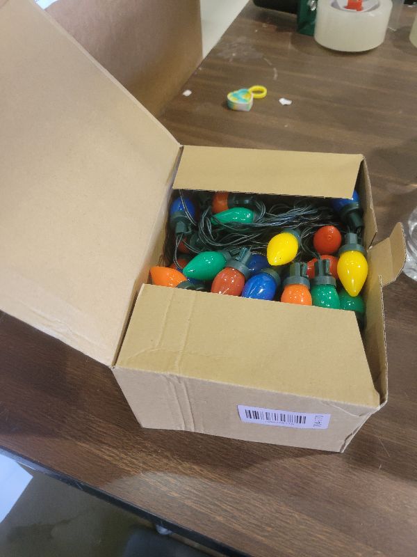 Photo 1 of 100 LED C7 Multicolor Christmas Lights Battery Operated with 8 Mode Remote Control, 2 Sets 27.5FT Colorful Christmas Tree Lights with 2 * 50pcs Twinkle C7 Light Bulbs for Home Porch Yard Decorations