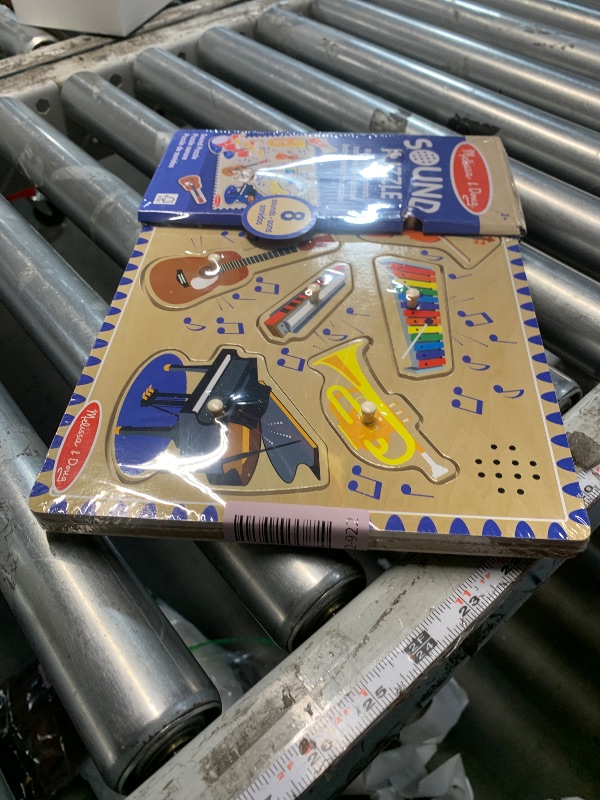 Photo 1 of ***FACTORY SEALED*** 
Melissa & Doug Musical Instruments Sound Puzzle - Wooden Peg Puzzle with Light-Activated Sound Effects (8 pcs) Wooden Peg Baby Music Learning Toys, for Toddlers and Preschoolers Ages 2+