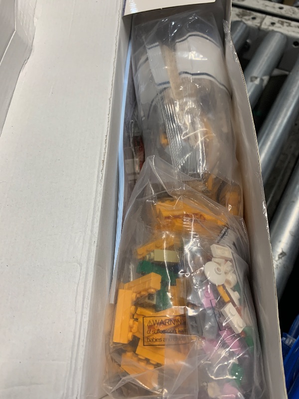 Photo 1 of ***FACTORY SEALED OPENED FOR INSPECTION ONLY ** Christmas House Building Set with LED Light, Story Movie Snow Village House Building Kit Compatible with Lego, Christmas Prefect Gift for Movie Fans, Boys, Girls, Adults, Friends (1146 Pcs)