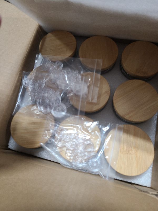 Photo 1 of 18-Pack 4oz Embossed Glass Candle Container with Bamboo Lids and Labels, Clear Candle Jars for Making Candles, Sun Moon Star Design