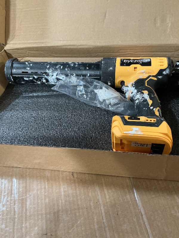 Photo 1 of ** heavily used **
** does not come with any accessories**

byczone Electric Caulking Gun Compatible With Dewalt 20V Max Battery, 10 Oz Cordless Caulk Gun with 6 Adjustable Speed, LED Light, Battery Powered Caulking Gun for Filling, Sealing, Repair (TOOL 