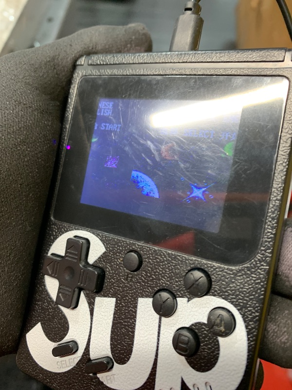 Photo 1 of ***BACK COVER BROKEN***
R36T Retro Handheld Game Console,WiFi Download Multiple Emulators,3.5'' IPS Screen,Retro Gaming Console Support WiFi Networked Fighting and OTG,Video Game Player for Christmas(Wood Grain Black)