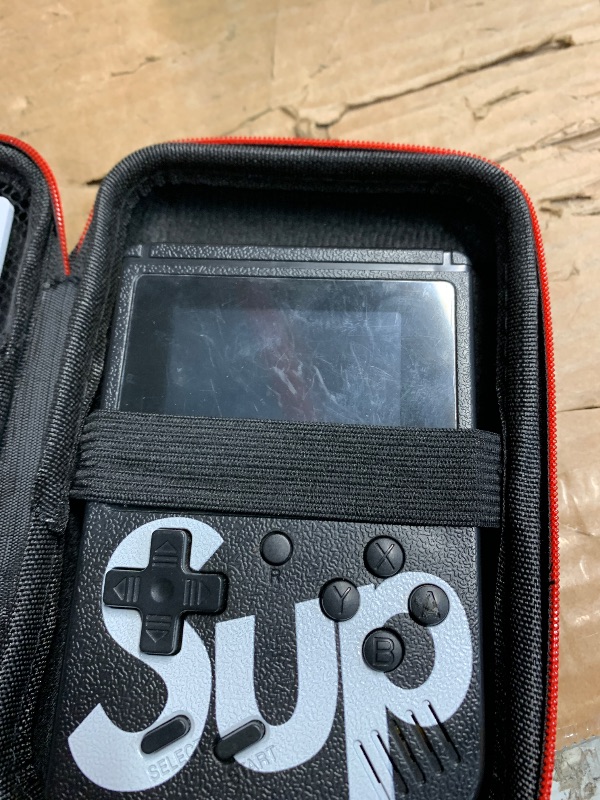 Photo 1 of ***BACK COVER BROKEN***
R36T Retro Handheld Game Console,WiFi Download Multiple Emulators,3.5'' IPS Screen,Retro Gaming Console Support WiFi Networked Fighting and OTG,Video Game Player for Christmas(Wood Grain Black)