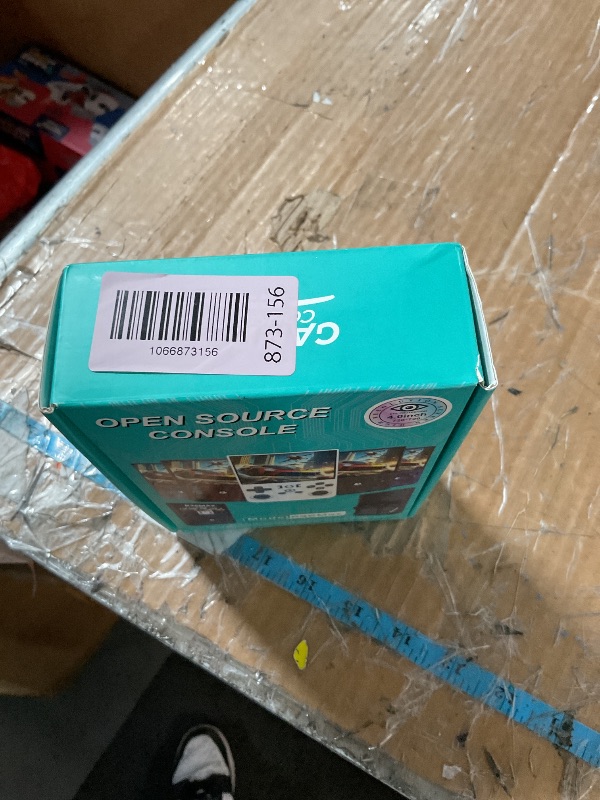 Photo 1 of ?R36MAX 4000mAh Portable Rechargeable Handheld Retro Game Console,Comfort Non-Slip Handheld Standing Retro Game Console with 64G TF Car,4.0-inch Screen,for Office,Black