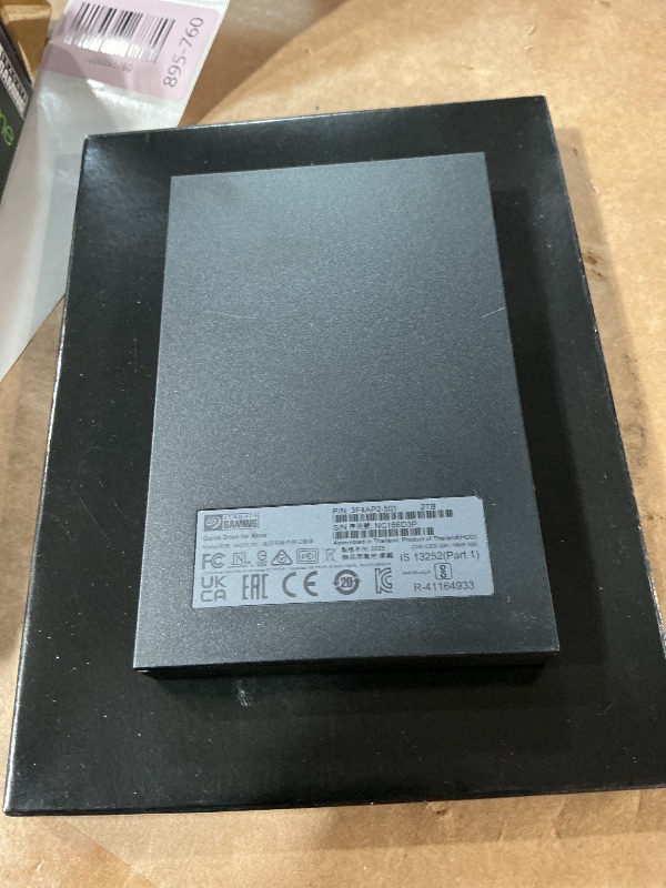 Photo 1 of ** FOR PARTS ONLY ** 
Seagate Game Drive for Xbox 2TB External Hard Drive Portable HDD - USB 3.2 Gen 1, Black with built-in green LED bar , Xbox Certified, 3 year Rescue Services (STKX2000400)