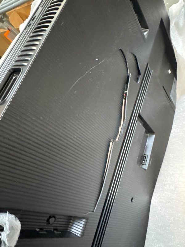 Photo 1 of ** MAJOR DAMAGE ON BACK  STILL WORKS **** Samsung 65-Inch Class QLED Q7F Series Samsung Vision AI Smart TV (2025 Model, 65Q7F) Quantum HDR, Object Tracking Sound Lite, Q4 AI Gen1 Processor, 4K upscaling, Gaming Hub, Alexa Built-in