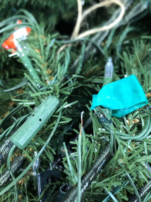 Photo 1 of *** LIGHTS DAMAGED ** National Tree Company 7.5 ft Pre-Lit Dunhill Fir Artificial Christmas Tree, 700 LED Lights, 2,514 Tips, Foot Pedal, 10 Light Functions, Includes Stand, Green