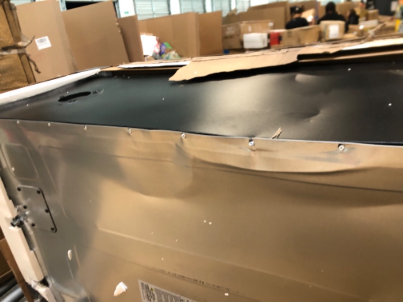 Photo 1 of ***HAS DENTS COMING OFF THE HNGES ***Masterbuilt® 40-inch Digital Electric Vertical BBQ Smoker with Leg Kit, Side Wood Chip Loader and 970 Cooking Square Inches in Black, Model MB20070122