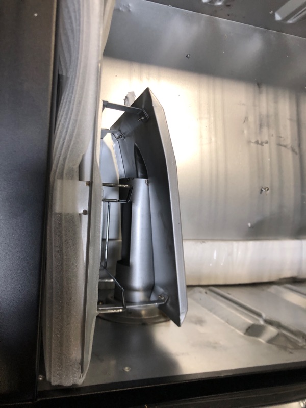 Photo 1 of ***HAS DENTS COMING OFF THE HNGES ***Masterbuilt® 40-inch Digital Electric Vertical BBQ Smoker with Leg Kit, Side Wood Chip Loader and 970 Cooking Square Inches in Black, Model MB20070122