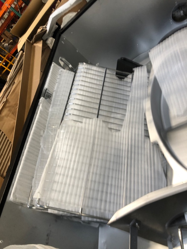 Photo 1 of ***HAS DENTS COMING OFF THE HNGES ***Masterbuilt® 40-inch Digital Electric Vertical BBQ Smoker with Leg Kit, Side Wood Chip Loader and 970 Cooking Square Inches in Black, Model MB20070122