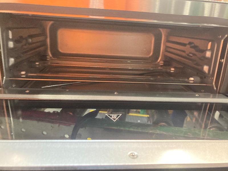 Photo 1 of **DENTED ON THE SIDE****Instant Pot No Preheat Required* 6-in-1 Pizza and Toaster Oven with InstantHeat Technology, Fits a 12" Fresh or Frozen Pizza, Bake, Toast, Broil, & Reheat
