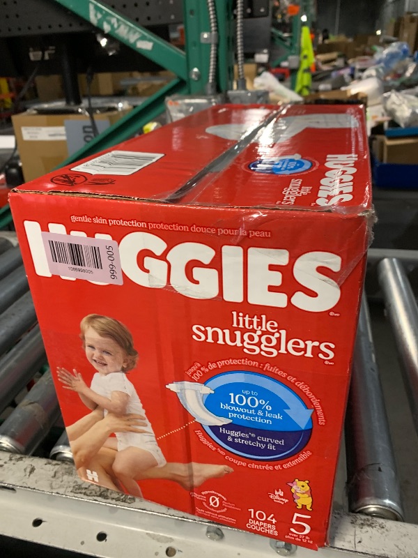 Photo 1 of ***FACTORY SEALED*** Huggies Size 5 Diapers, Little Snugglers Baby Diapers, Size 5 (27+ lbs), 104 Count, Packaging May Vary