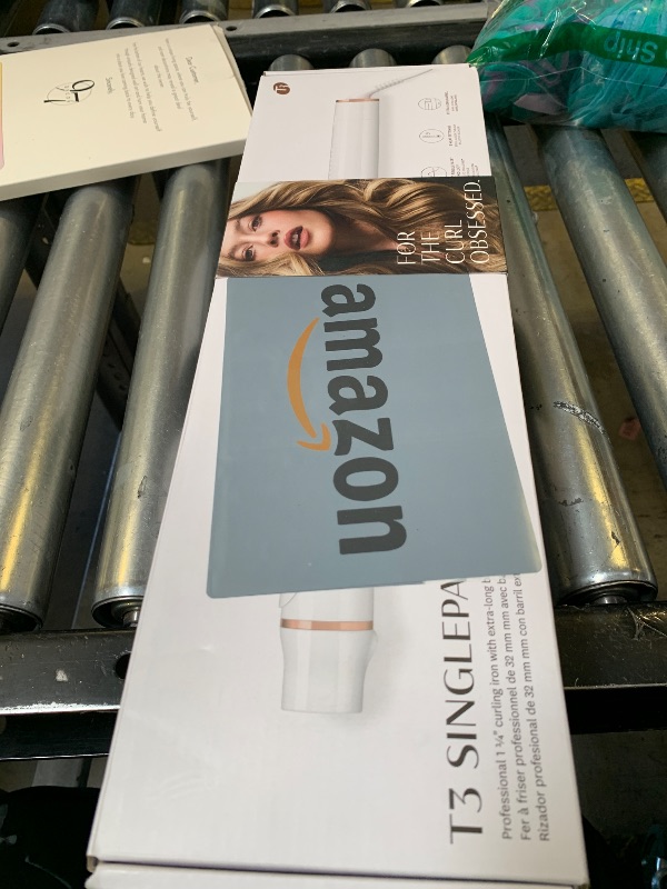 Photo 1 of T3 SinglePass Curl X Extra-Long Barrel Curling Iron with 9 Heat Settings and Ceramic Barrel for Fast Styling and Lasting Results on All Hair Types