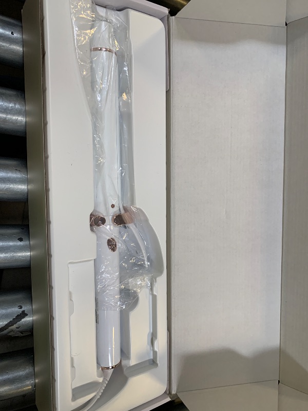 Photo 1 of T3 SinglePass Curl X Extra-Long Barrel Curling Iron with 9 Heat Settings and Ceramic Barrel for Fast Styling and Lasting Results on All Hair Types