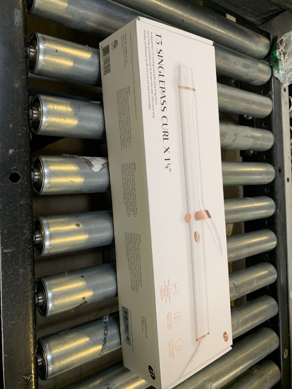 Photo 1 of T3 SinglePass Curl X Extra-Long Barrel Curling Iron with 9 Heat Settings and Ceramic Barrel for Fast Styling and Lasting Results on All Hair Types