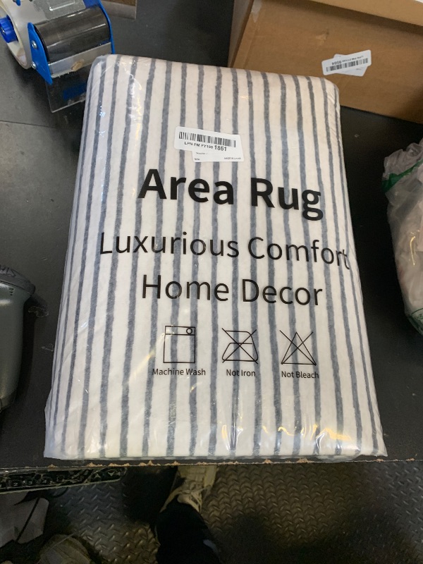 Photo 1 of Wonnitar 5x7 Washable Striped Living Room Area Rug, Non-Slip Grey Boho Rugs for Bedroom, Low Pile Soft Minimalist Floor Carpets for Dining Room Home Office (Grey,5' x 7')