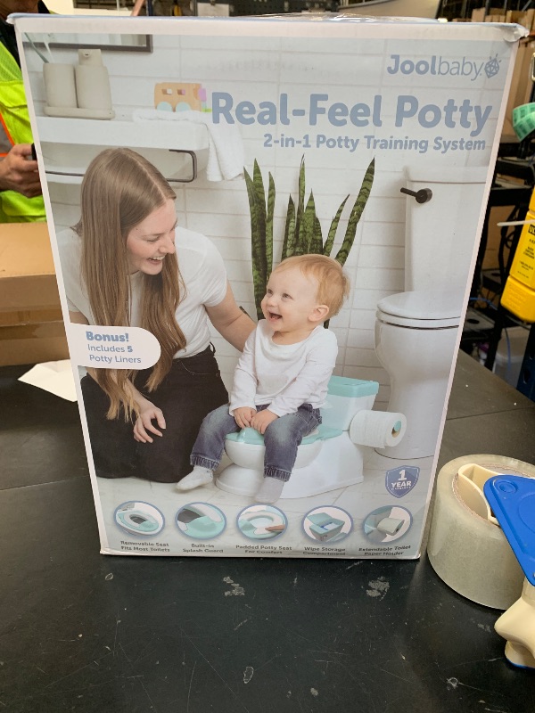 Photo 1 of Real Feel 2-in-1 Potty with Wipes Storage, Flushing Sounds & Disposable Liners - Realistic Toilet - Easy to Clean & Assemble - Jool Baby (Aqua)