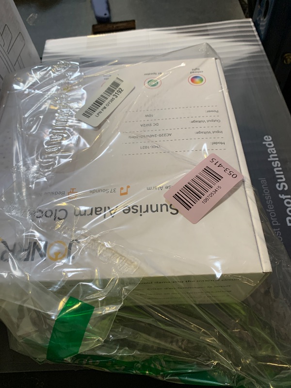 Photo 1 of JONRRYIN Tap Snooze Sunrise Alarm Clock, Wake Up Light Alarm with Remote Control, Bluetooth Speaker & USB Charging, 37 Sounds White Noise Machine, 15 Colors Dimmable Night Light for Heavy Sleepers