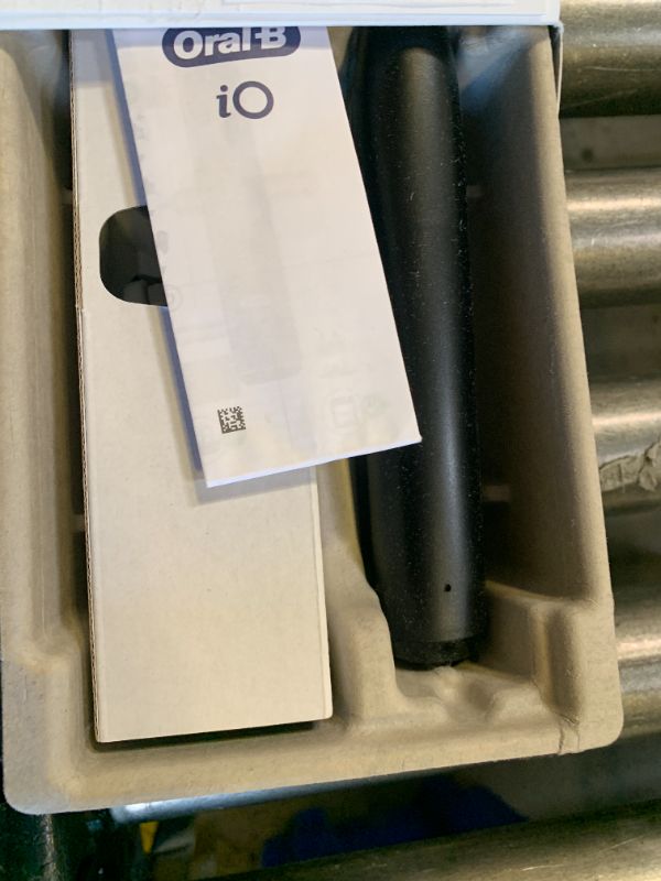 Photo 1 of Oral-B iO Deep Clean + Whiten Rechargeable Electric Toothbrush with Visible Pressure Sensor, 2 Minute Timer, 5 Cleaning Settings, 1 iO5 Limited, 3 Toothbrush Heads, Travel Case & Refill Holder, Black