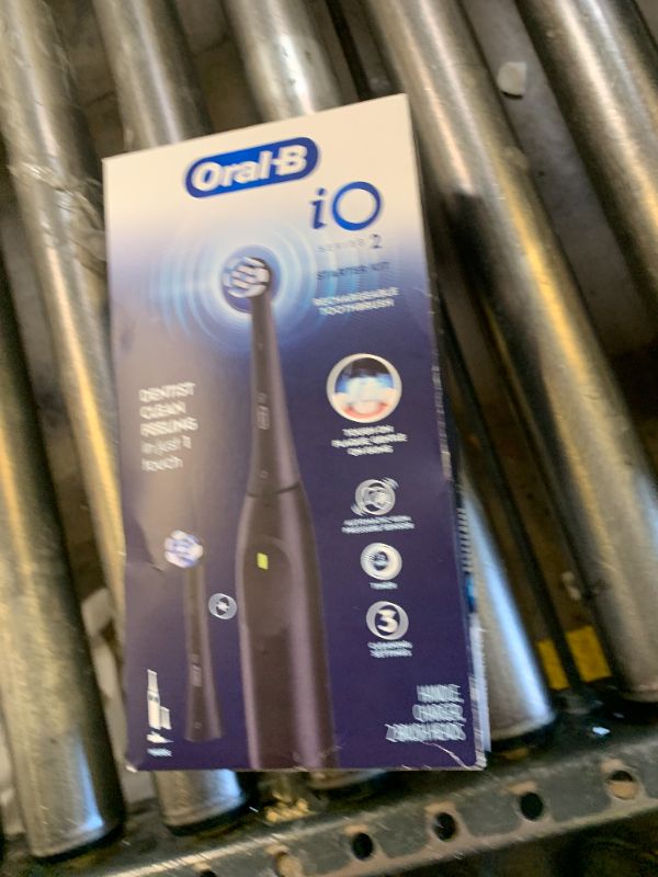 Photo 1 of Oral-B iO Deep Clean + Whiten Rechargeable Electric Toothbrush with Visible Pressure Sensor, 2 Minute Timer, 5 Cleaning Settings, 1 iO5 Limited, 3 Toothbrush Heads, Travel Case & Refill Holder, Black