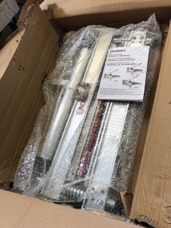 Photo 1 of ROBERTS 10-99 Multi-Floor Cutter for Laminate, Engineered Wood, Carpet Tile, and Vinyl Floors, 18"