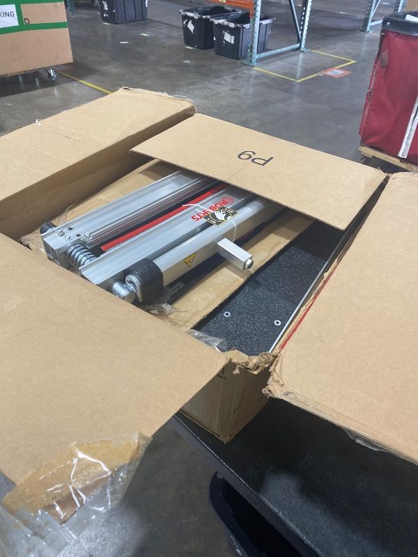 Photo 1 of ROBERTS 10-99 Multi-Floor Cutter for Laminate, Engineered Wood, Carpet Tile, and Vinyl Floors, 18"